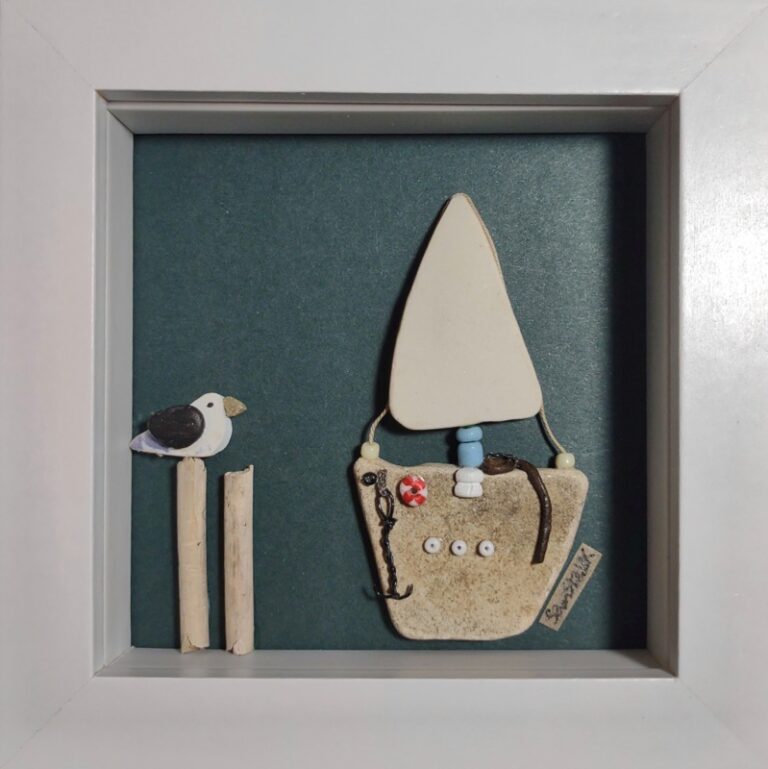 Handmade boat artwork from found materials