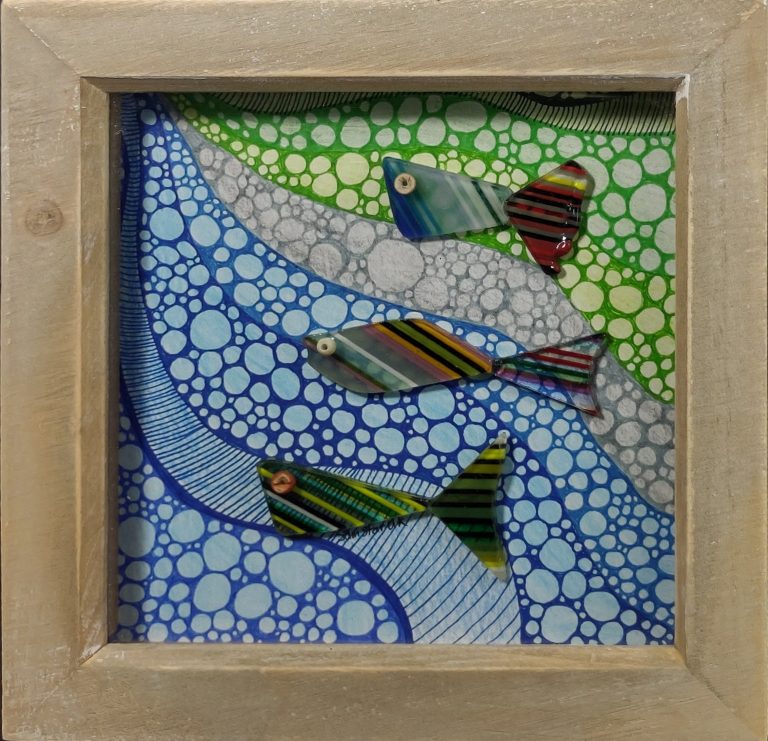 Handmade fish artwork from sea glass and pottery shards