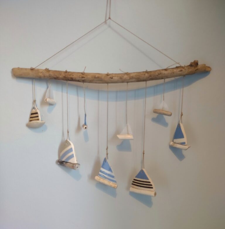 Handmade mobile sculptures from found objects